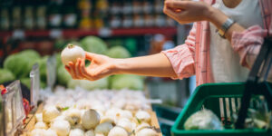 woman-buying-grocery-store_1303-14081