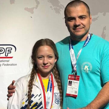 Марія Поступайло з Вінниці з тренером
