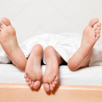 depositphotos_8495242-stock-photo-feet-of-couple-in-bed Замість плетіння косичок — інтим-салон: у Вінниці засудили жінку за організацію місця розпусти
